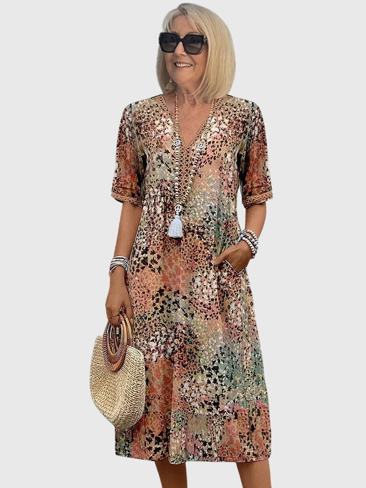 Modehus | Elegant Midikjole med Blomster